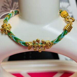 Tory Burch  Gold and Green Bracelet with fish and iconic Tory Burch sign